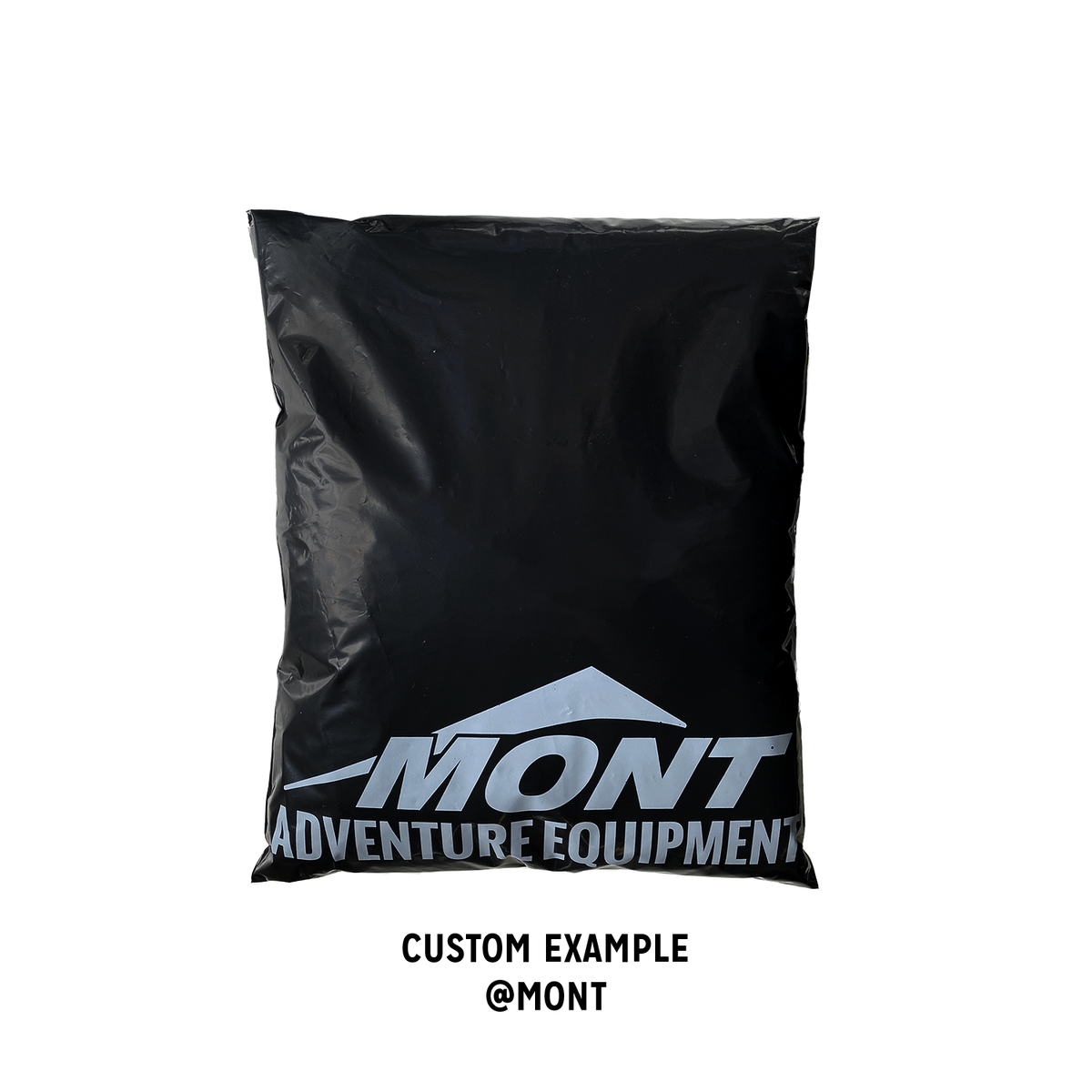 Mont Adventure Equipment branded custom Better Packaging POLLAST!C black mailer on a transparent background